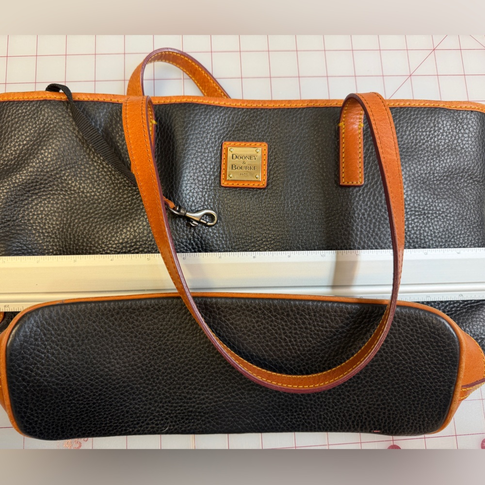 Dooney & Bourke Black Pebbled Leather Messenger with Tan Trim
Approx 15x10